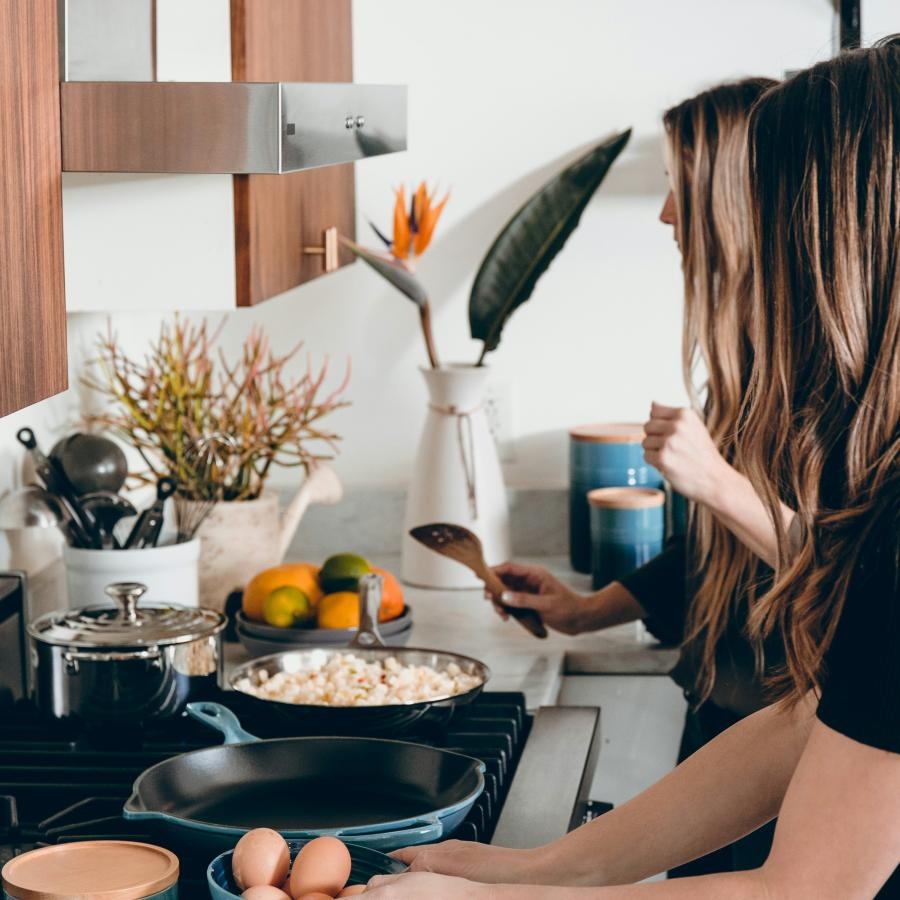 a person cooking in the kitchen