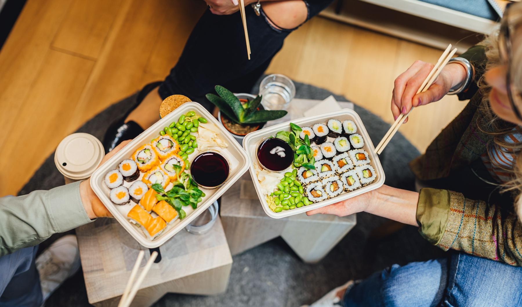 a group of people eating food